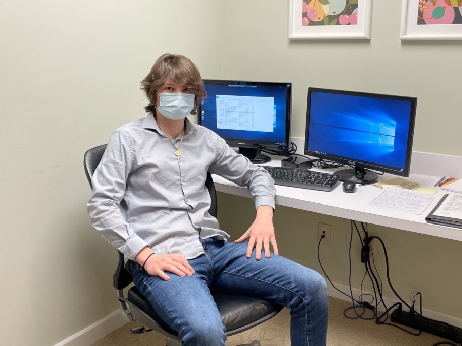 boy sitting at a computer